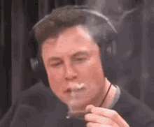elon-musk-smoke.gif