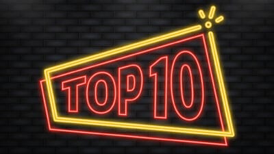 A neon sign says 'Top Ten'.'Top Ten'.