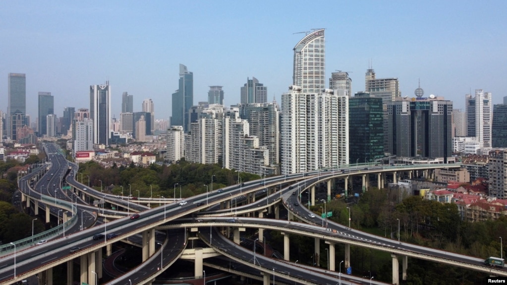 FILE - An aerial view shows highways and buildings in Shanghai, China, March 30, 2022. 